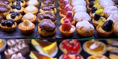 A case of small pastries at Croissant Gourmet