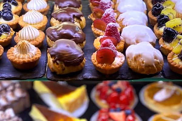 A case of small pastries at Croissant Gourmet