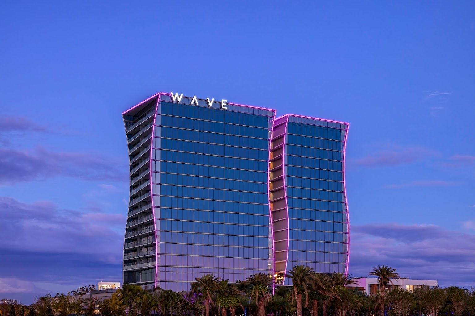 wave hotel with a purple hue at sunset