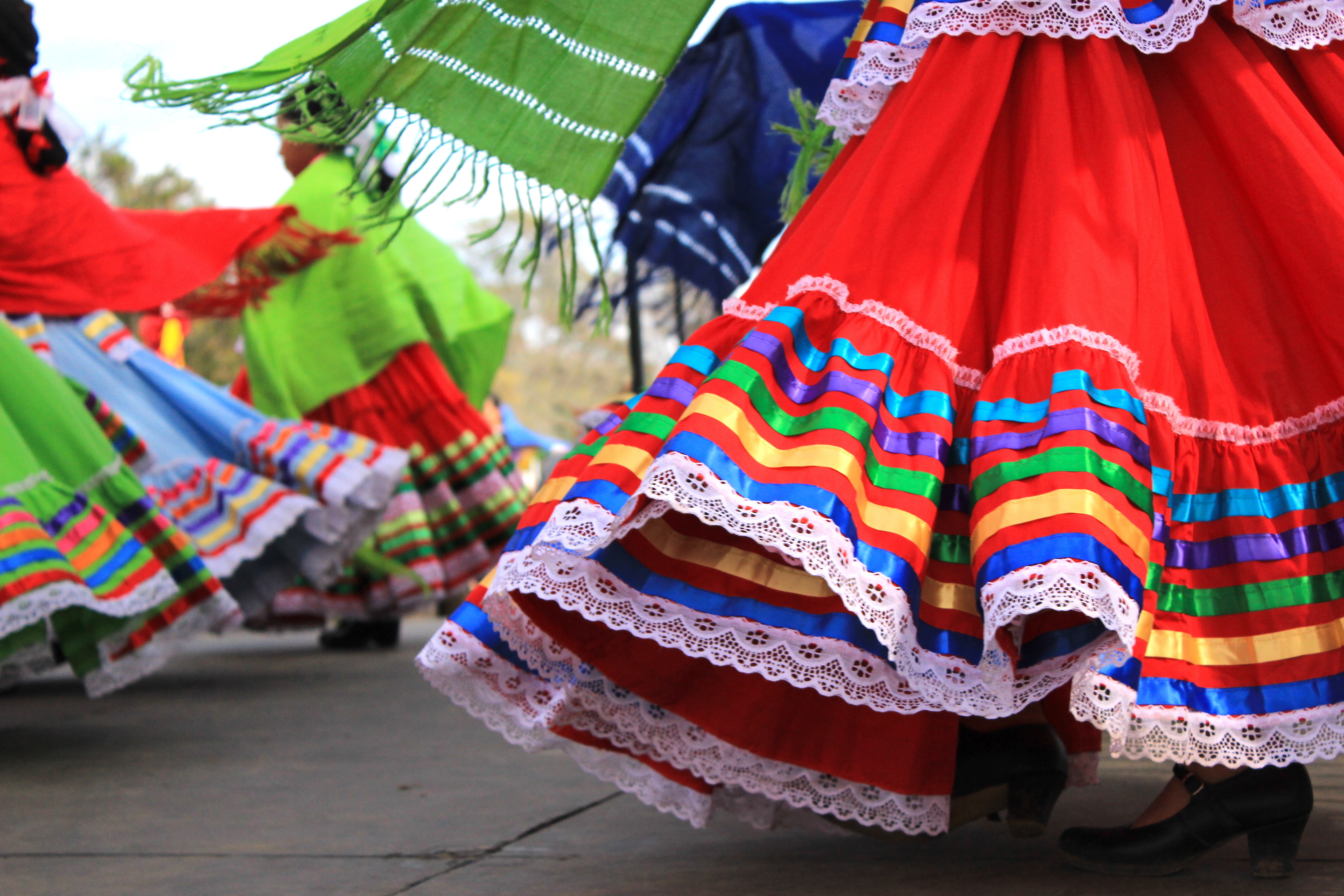 colorful hispanic skirts with women dancing