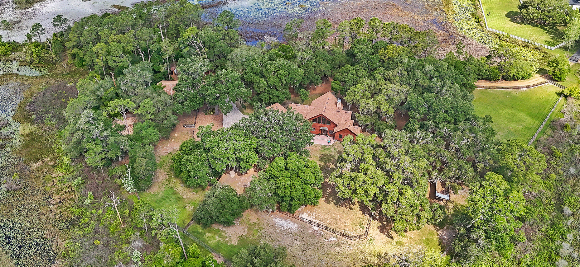 Aerial view of a home on a wetland preserve