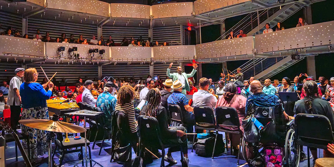 An orchestra performing at Dr. Phillips Center for the Performing Arts