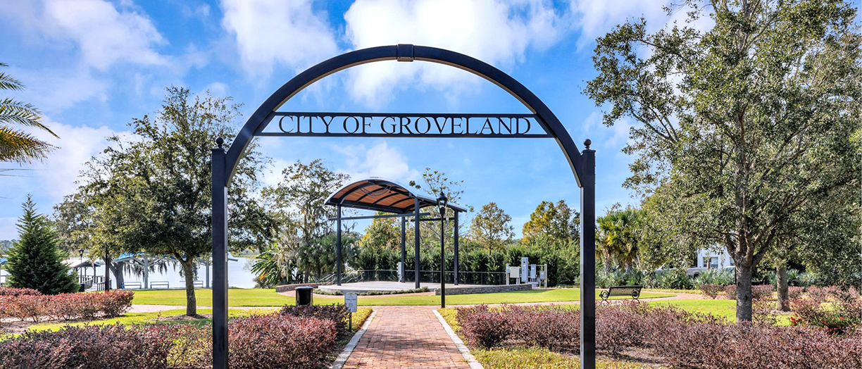 City of Groveland gate above a walking path