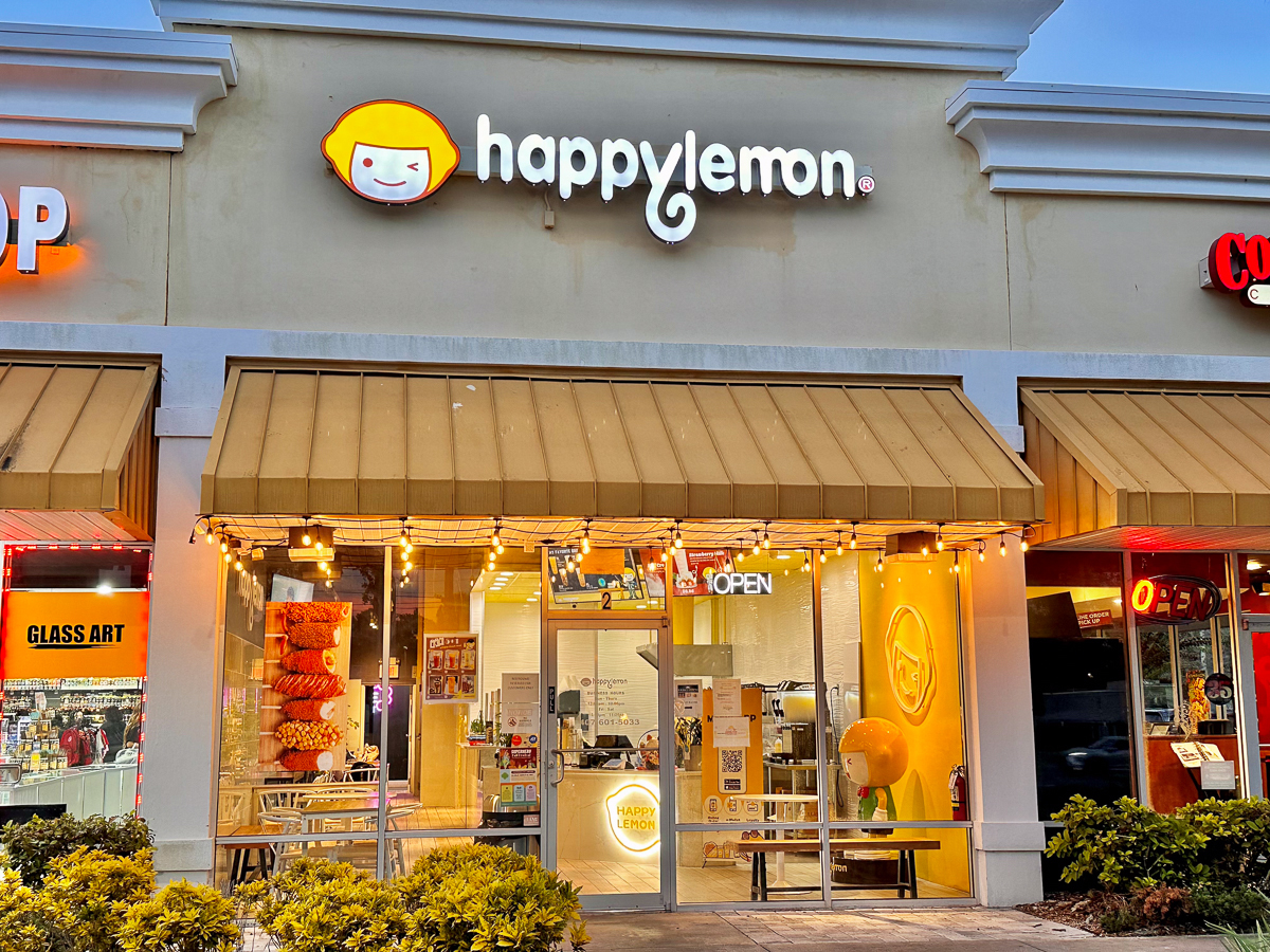 outside happy lemon store with yellow and white sign