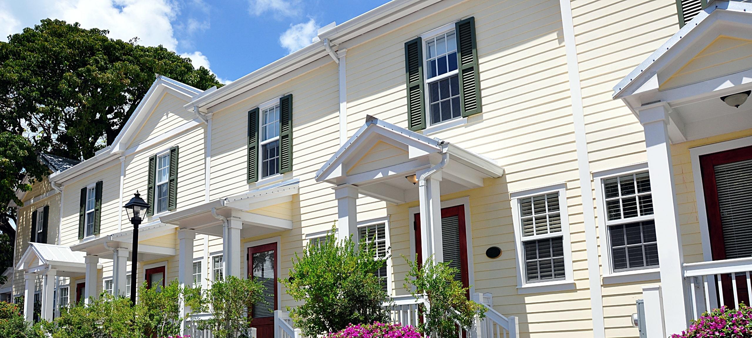 Row of traditional style townhomes, typical of College Park, Orlando neighborhood