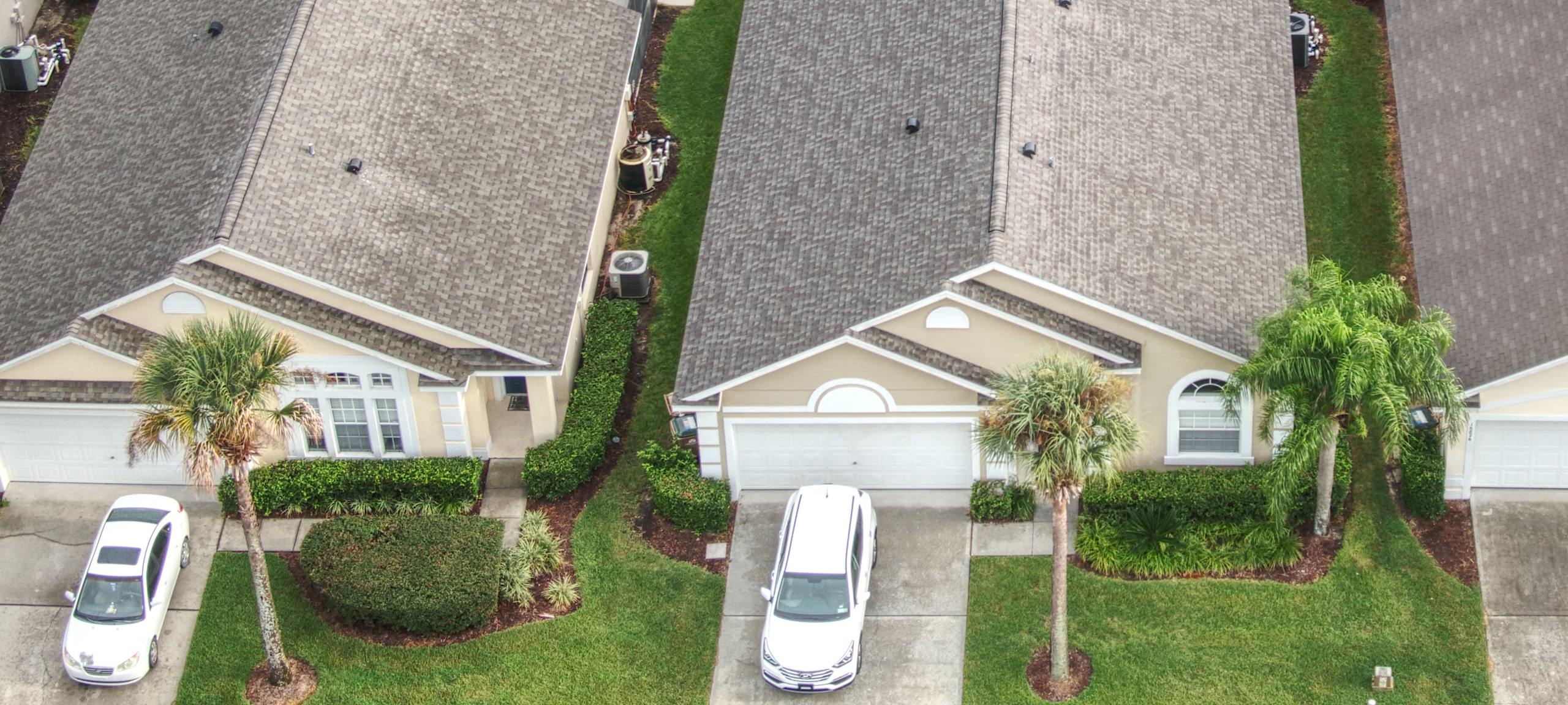 Aerial view of Orlando area homes with cars in driveways