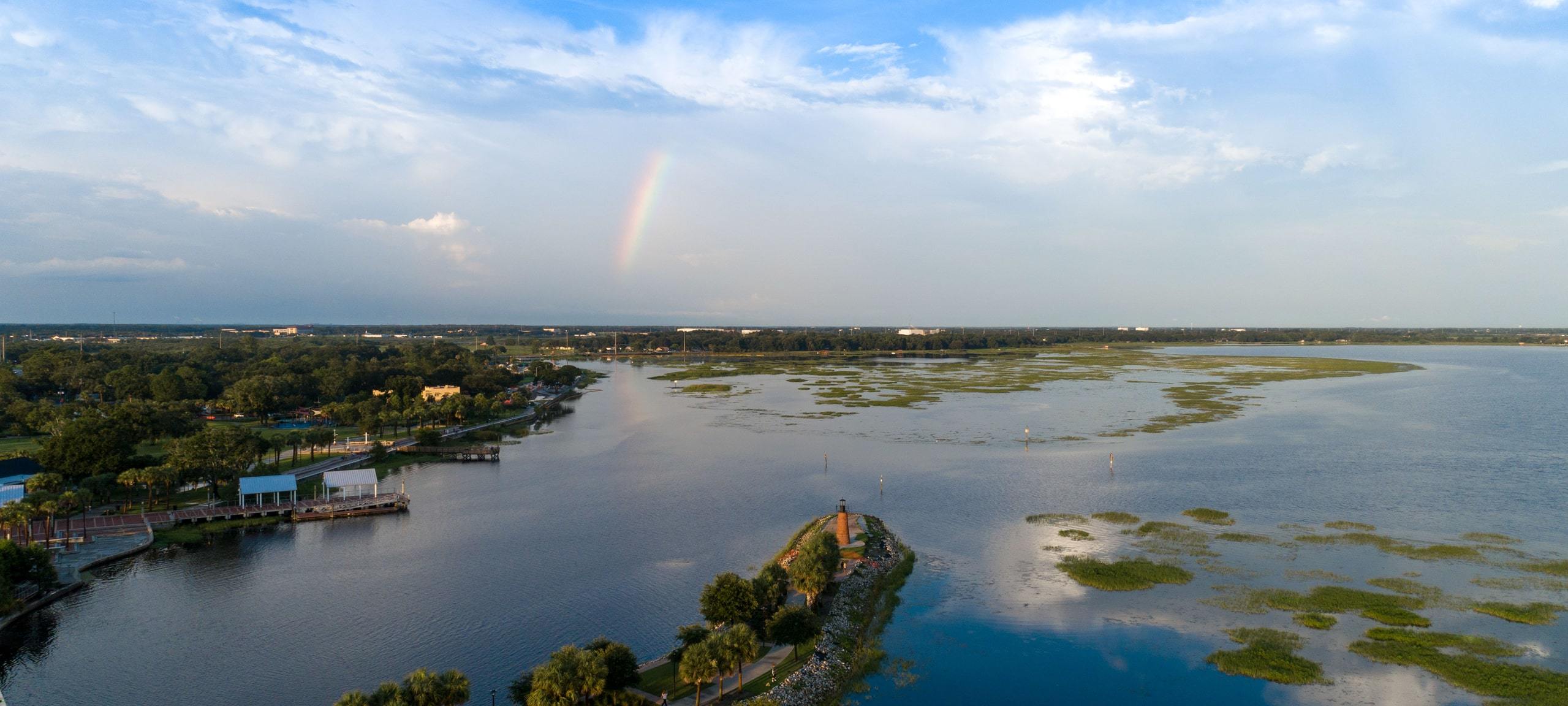 Rainbow over Kissimmee lakefront, aerial view