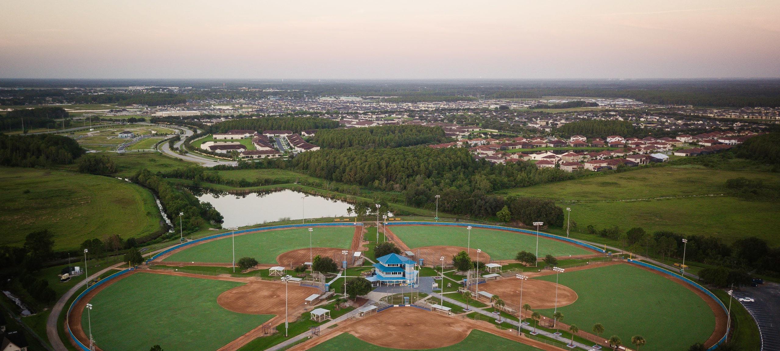 Aerial view of old Osceola County Softball Complex during sunset in Kissimmee, FL