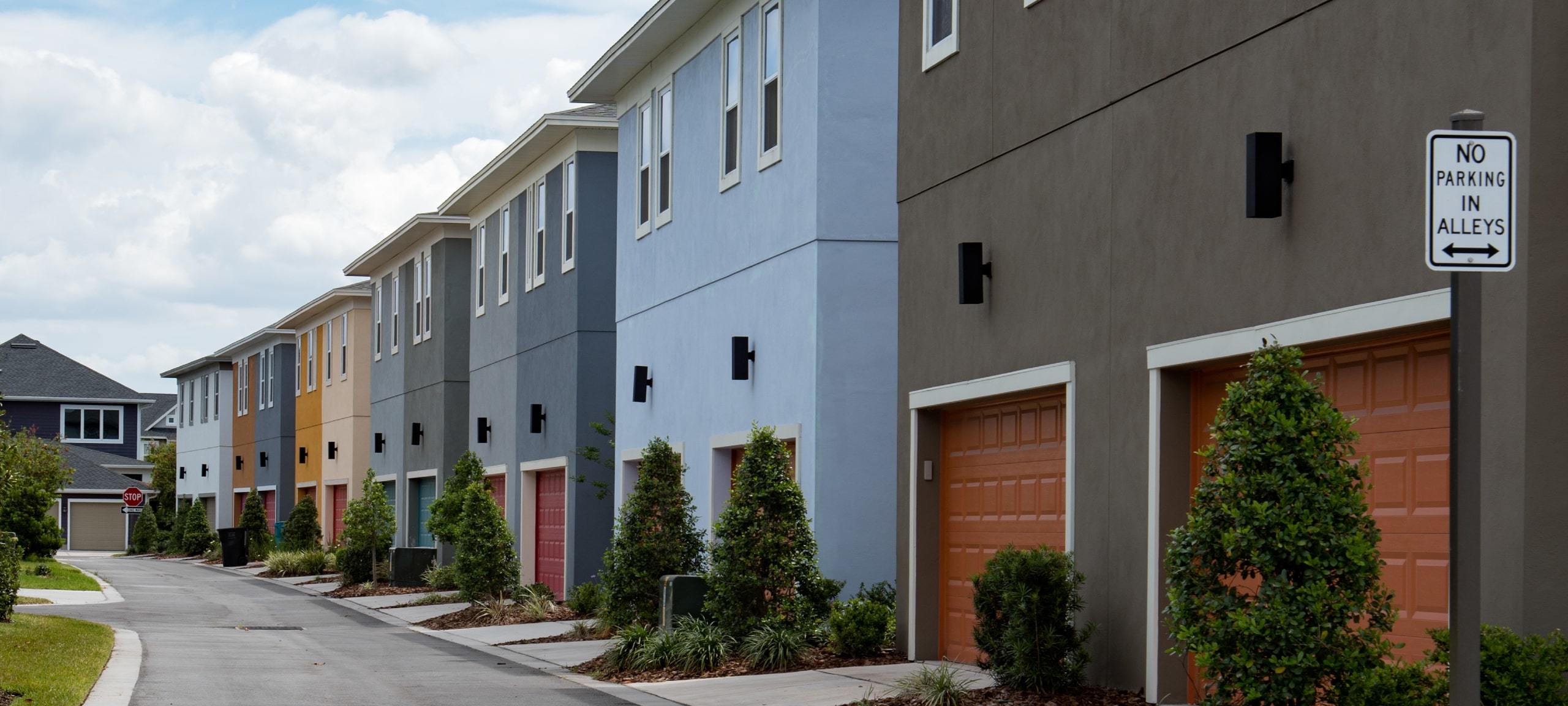 Row of Lake Nona townhomes, back view, on street