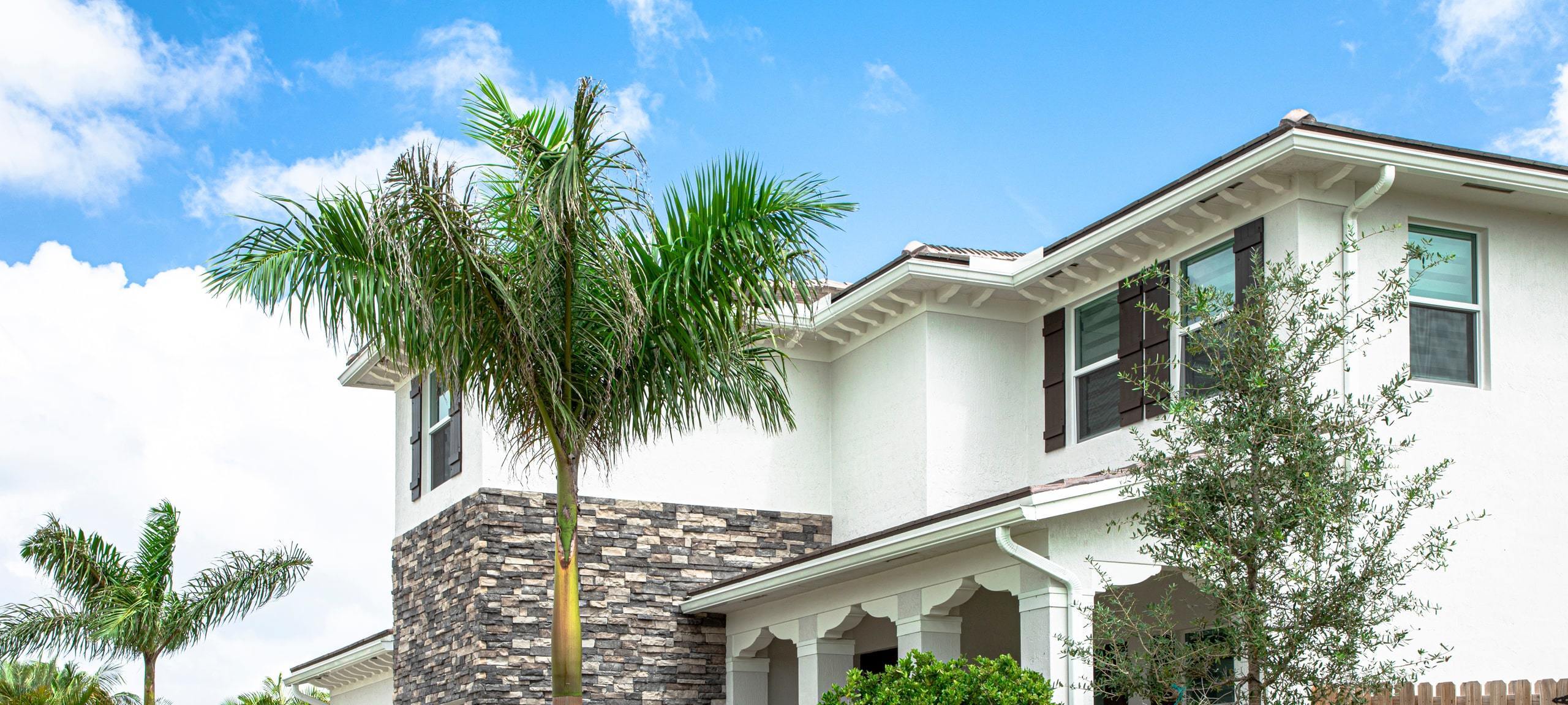 A single family home with stone exteriors in Reunion, Florida.