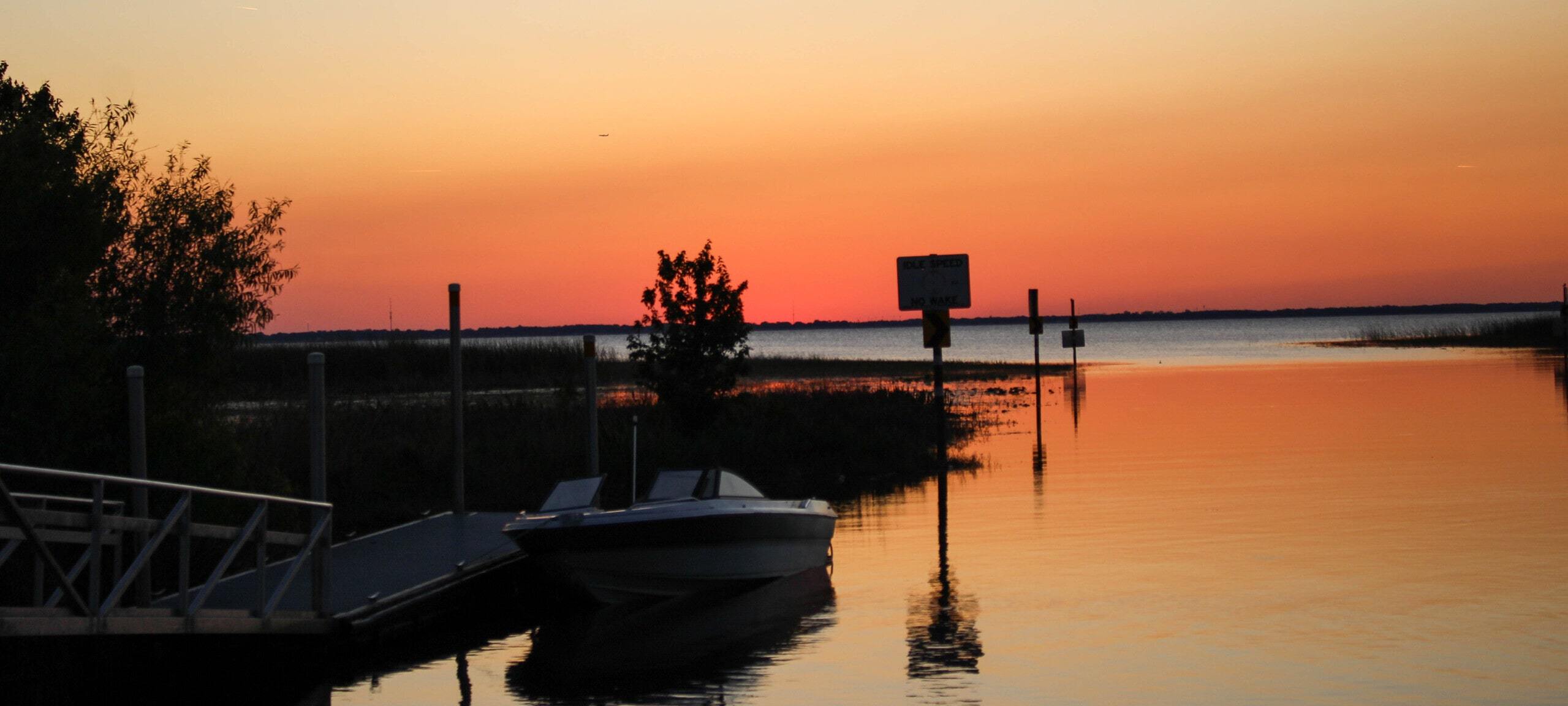 Sunset at waterfront at Chisholm Park Boat Ramp in St. Cloud, FL